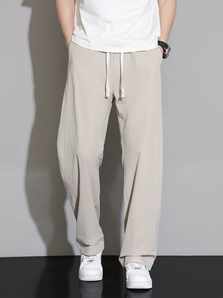 Quần jeanswest ống rộng phong cách Mỹ thời thượng dành cho nam, mùa xuân thu, quần thể thao dáng rộng đa năng cao cấp.
