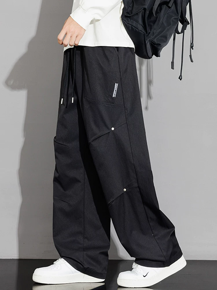 Quần dài ống rộng phong cách Mỹ của Jeanswest dành cho nam, quần dài ống rộng đa năng, thương hiệu thời trang xuân thu cao cấp.