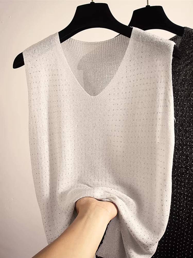 Hàng thanh lý áo vest nữ kiểu Âu, có mác, chất liệu lụa bóng, đính đá, cổ V, dáng rộng, màu trơn, không tay.