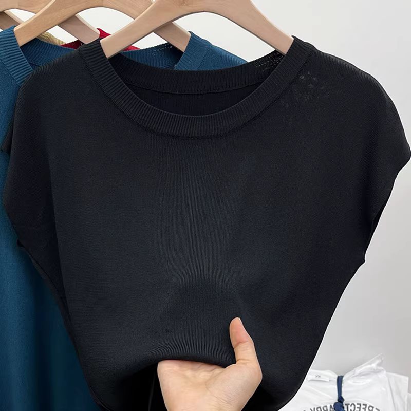 Thâm Quyến Nanyou quần áo nữ cao cấp phong cách châu Âu cắt nhãn độc đáo áo vest dệt kim cổ điển phong cách Pháp áo khoác ngoài không tay dáng rộng