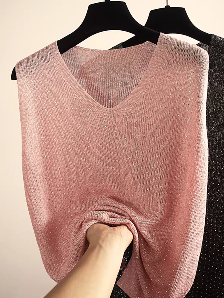 Hàng thanh lý áo vest nữ kiểu Âu, có mác, chất liệu lụa bóng, đính đá, cổ V, dáng rộng, màu trơn, không tay.