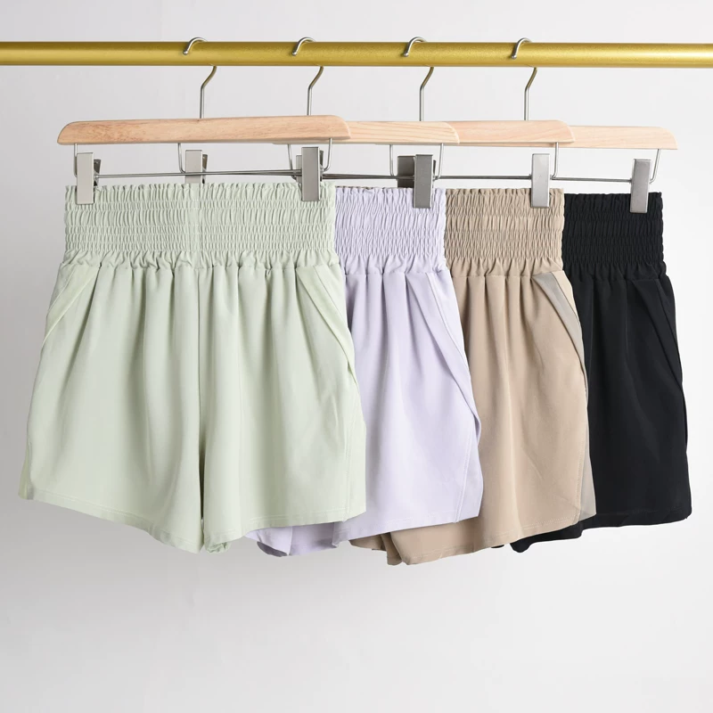 Quần short thể thao rộng rãi, thoải mái dành cho nữ, quần short tập yoga nhanh khô, quần short tập thể dục ngoài trời hai trong một chống lộ hàng.