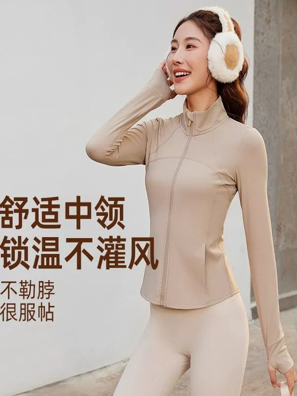 Áo khoác thể thao mùa thu đông mới dành cho nữ, kiểu dáng ôm sát với cổ đứng và có túi, thích hợp cho chạy bộ ngoài trời, tập thể dục và yoga.