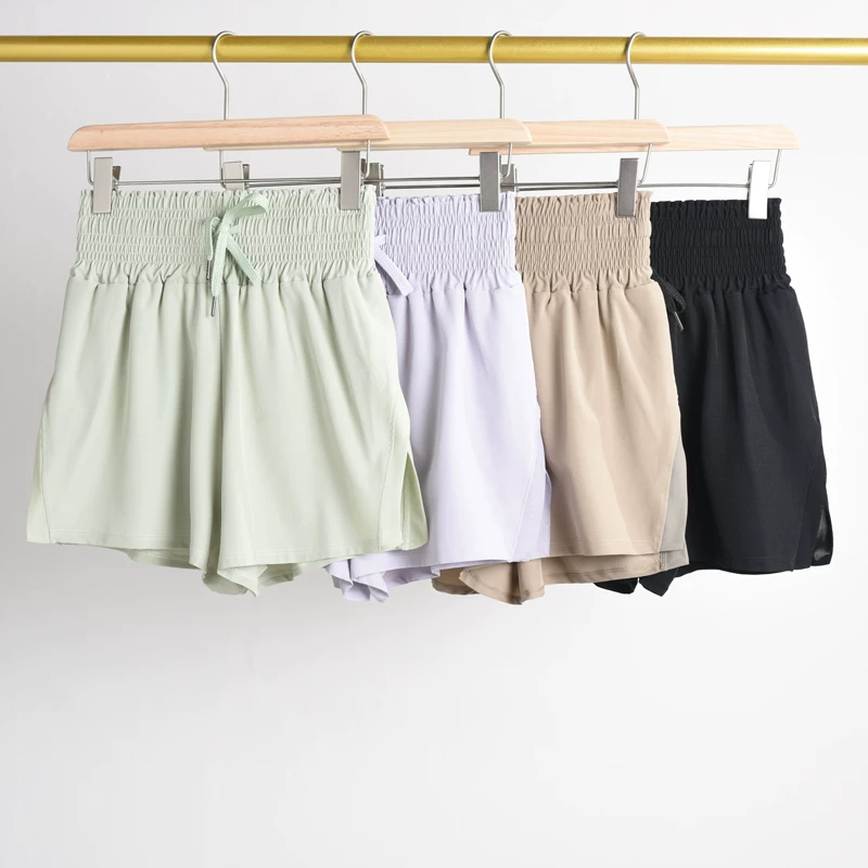 Quần short thể thao rộng rãi, thoải mái dành cho nữ, quần short tập yoga nhanh khô, quần short tập thể dục ngoài trời hai trong một chống lộ hàng.