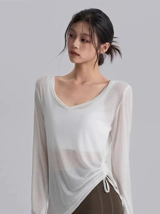 Áo thun thể thao dài tay, chất liệu mỏng, nhanh khô, kiểu dáng ôm dáng, có dây rút, thích hợp cho yoga, pilates, chạy bộ.