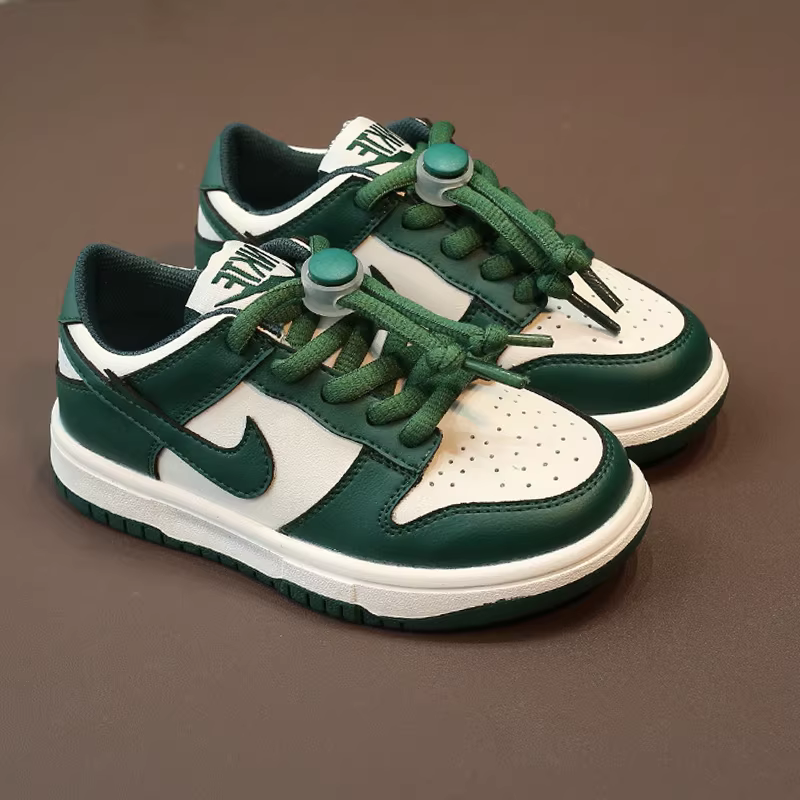 Giày thể thao da thật trẻ em 2025 mẫu mới xuân thu, giày chống trơn cho bé trai, giày trẻ em đen trắng, giày panda trắng thời trang