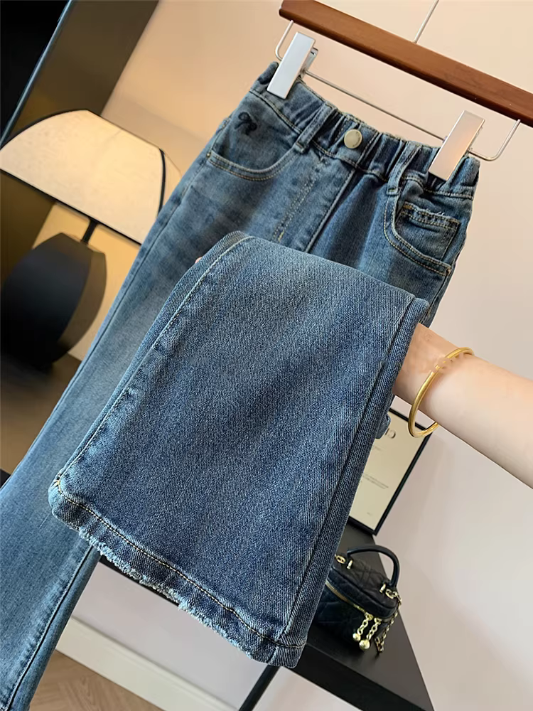 Quần nhung liền thân dáng ôm đa năng cho bé gái, quần denim cạp cao giặt mềm mùa thu đông 2025 mới
