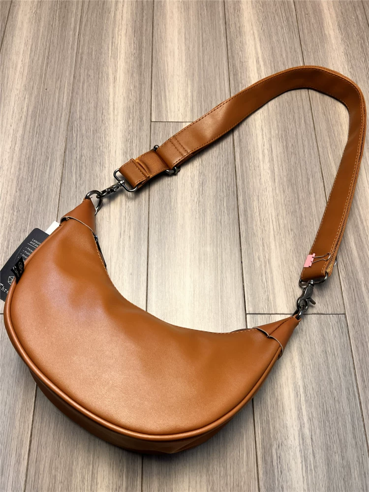 Túi đeo chéo nam thời trang đa năng kiểu dáng mới 2025, túi đeo vai đơn cá tính, túi hình lưỡi liềm độc đáo, balo dạng bánh bao