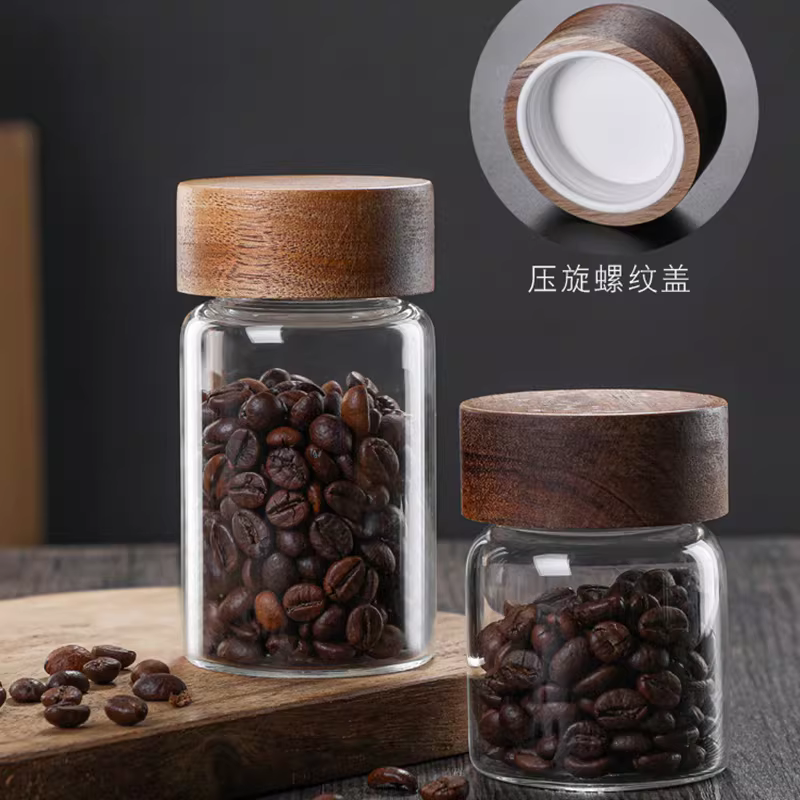Hũ thủy tinh chịu nhiệt có nắp gỗ keo, dùng để đựng trà, hoa quả khô, đựng cà phê, bột thực phẩm trong suốt