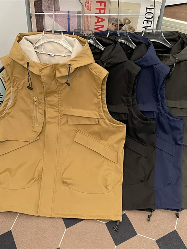 Áo vest không tay kiểu dáng dã ngoại dành cho nam, áo vest công sở nhiều túi đa năng mùa hè, áo khoác có mũ trùm đầu rộng rãi phong cách Mỹ thời thượng.