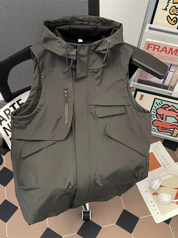 Áo vest không tay kiểu dáng dã ngoại dành cho nam, áo vest công sở nhiều túi đa năng mùa hè, áo khoác có mũ trùm đầu rộng rãi phong cách Mỹ thời thượng.