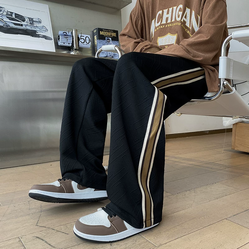 Quần nam mùa xuân thu mới, kiểu dáng thời thượng, quần thể thao may viền, phong cách đường phố Mỹ, dáng rộng, thoải mái, ống thẳng, dài.