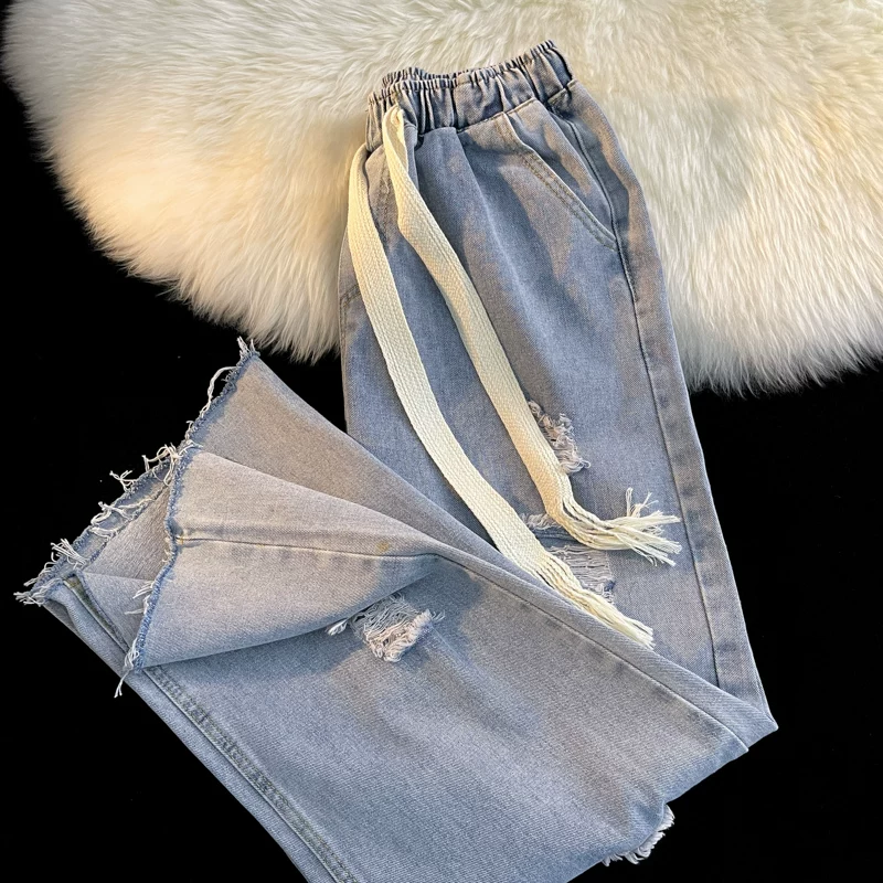 Quần jean rách kiểu Nhật dành cho nam, quần đôi sinh viên đa năng mùa hè, quần dài ống rộng có dây rút hợp thời trang.