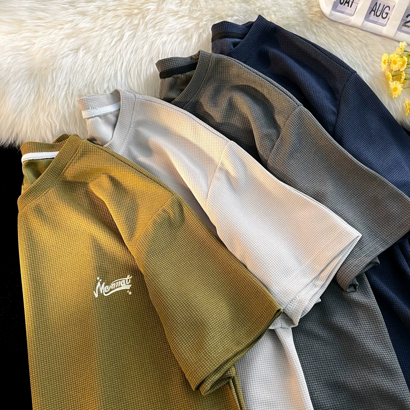 Áo thun waffle kiểu Hồng Kông dành cho nam, áo thun tay ngắn cổ tròn rộng rãi mùa hè, áo cặp đôi sinh viên thời trang tay lửng.