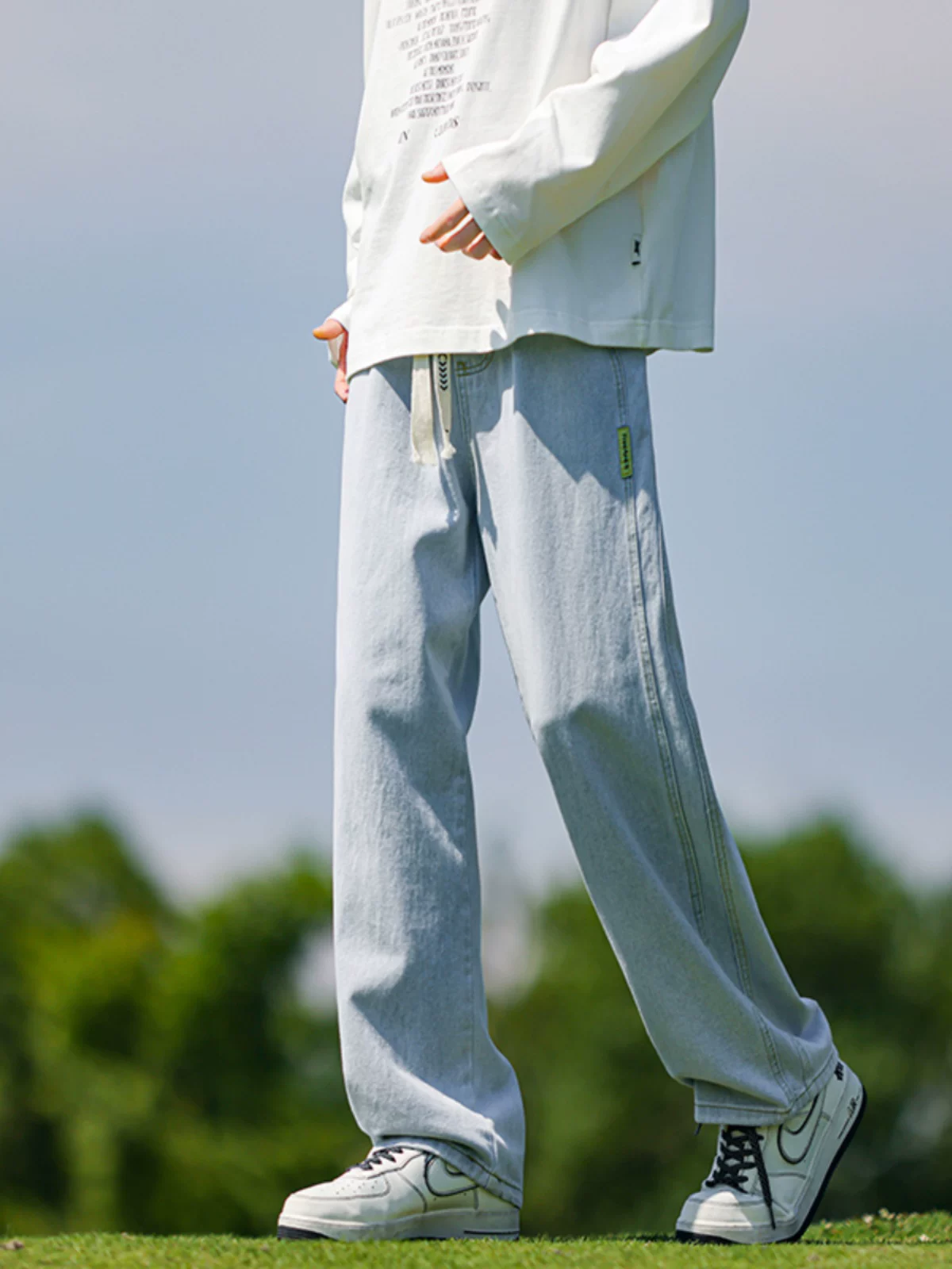 Quần jeans ống đứng dây rút nam hè 2025 kiểu mới đa năng phong cách học sinh Mỹ thời thượng, chất liệu washed, quần dài mặc thường ngày