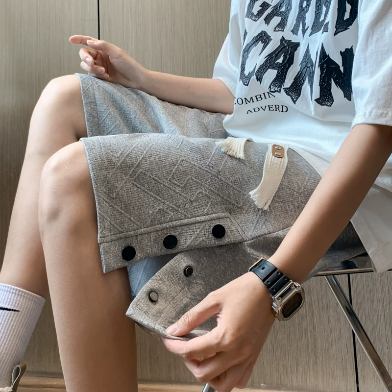 Quần short thể thao có cúc cho nam, quần jacquard thời trang phong cách Hồng Kông, quần short năm điểm dáng rộng thoải mái mùa hè.