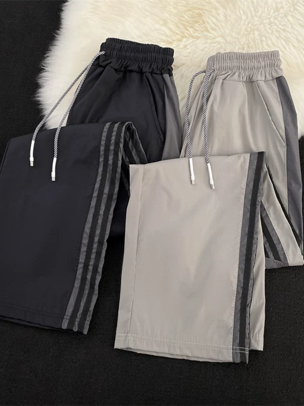 Quần nam phối màu chắp vá, quần thể thao nhanh khô kiểu Mỹ mỏng mùa hè, quần jogger ống rộng dáng thẳng thời trang.