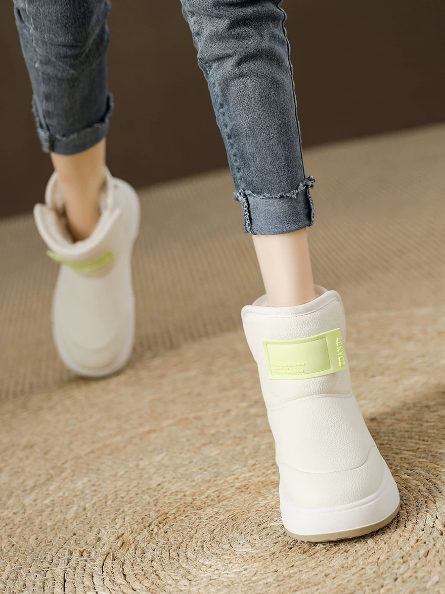 Giày bốt tuyết đế dày chống trơn cho nữ, da thật, lót lông cừu, kiểu mới mùa đông 2025, giày bông dày giữ ấm.