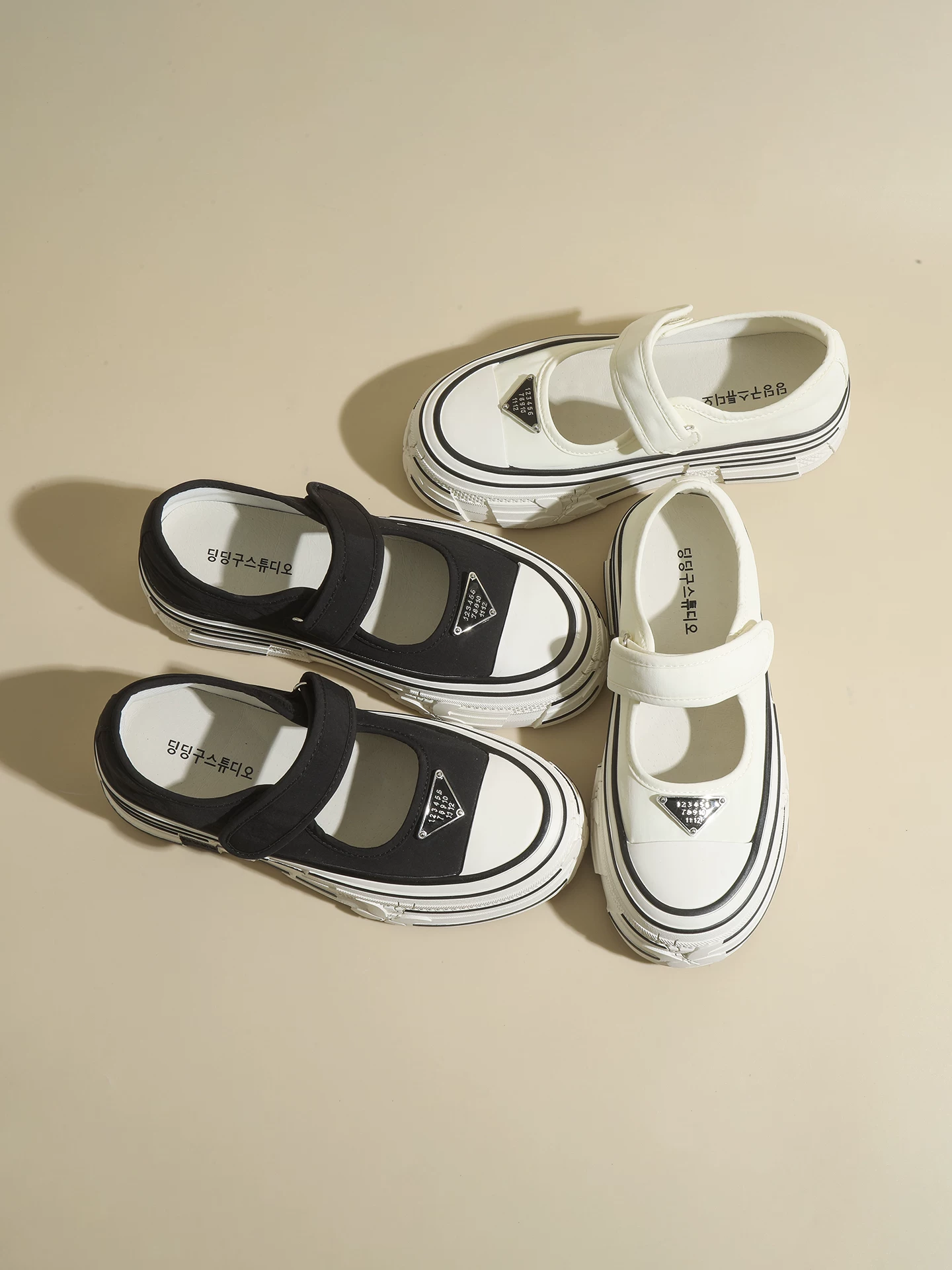 Giày vải canvas nữ logo tam giác Mary Jane, giày thể thao đế dày tăng chiều cao, giày đơn miệng nông thoáng khí mới mùa hè 2026.