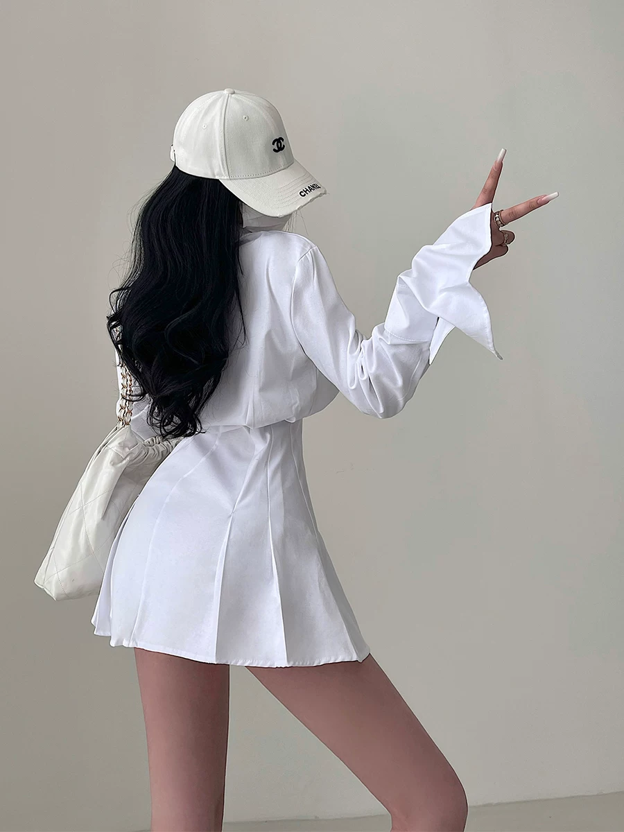 YoungGirlDay Váy sơ mi dài tay ôm sát gợi cảm phong cách Âu Mỹ với eo xếp ly và chân váy ngắn.