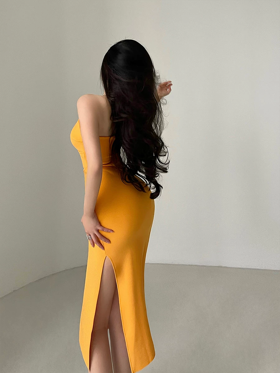 Váy ôm sát bodycon dáng dài vừa phải, xẻ tà, xếp ly, gợi cảm, kiểu dáng trẻ trung, thuần khiết, quyến rũ.