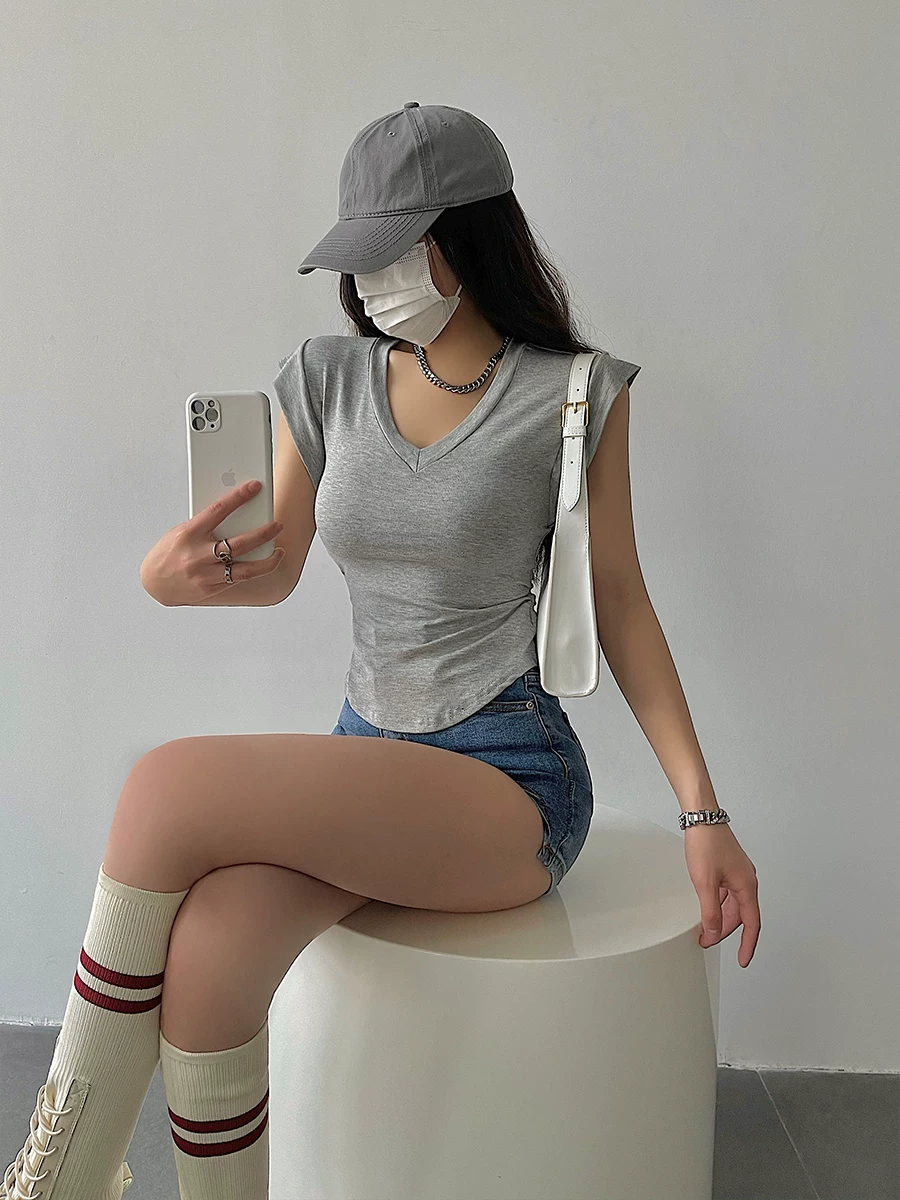 YoungGirlDay khao khát thuần khiết gợi cảm cổ chữ V ôm sát eo cong viền áo thun tay bồng nhỏ