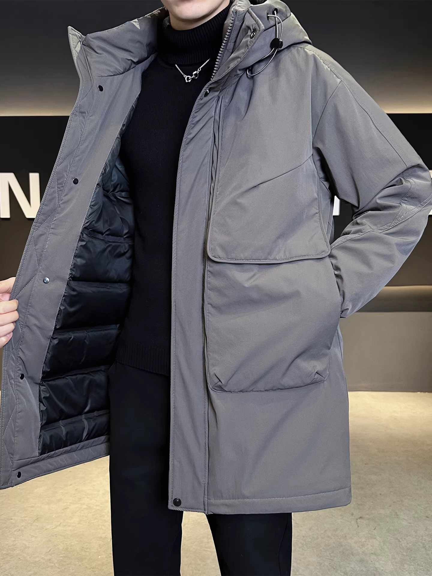 Áo khoác phao nam có mũ trùm đầu, dài trung bình, mẫu mới mùa đông 2025, chất lượng cao, dáng rộng, chống lạnh, ấm áp và dày dặn.