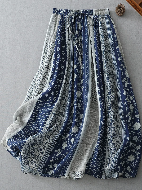 Váy dài nữ mùa hè 2025 chất liệu cotton và lanh vintage, họa tiết in hoa văn đồng quê độc đáo, phối màu nổi bật, đa năng