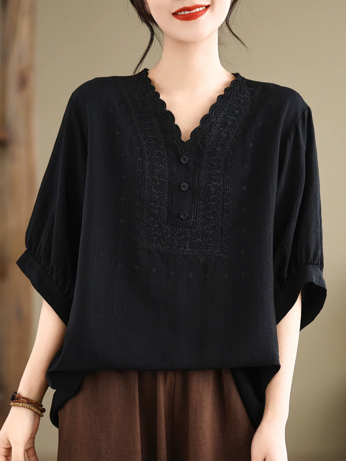 Áo thun nữ tay ngắn cổ tròn chất liệu cotton-linen dáng rộng cỡ lớn, kiểu mới 2026, che bụng và giấu mỡ thừa, áo nửa tay giúp thon gọn, hợp thời trang.