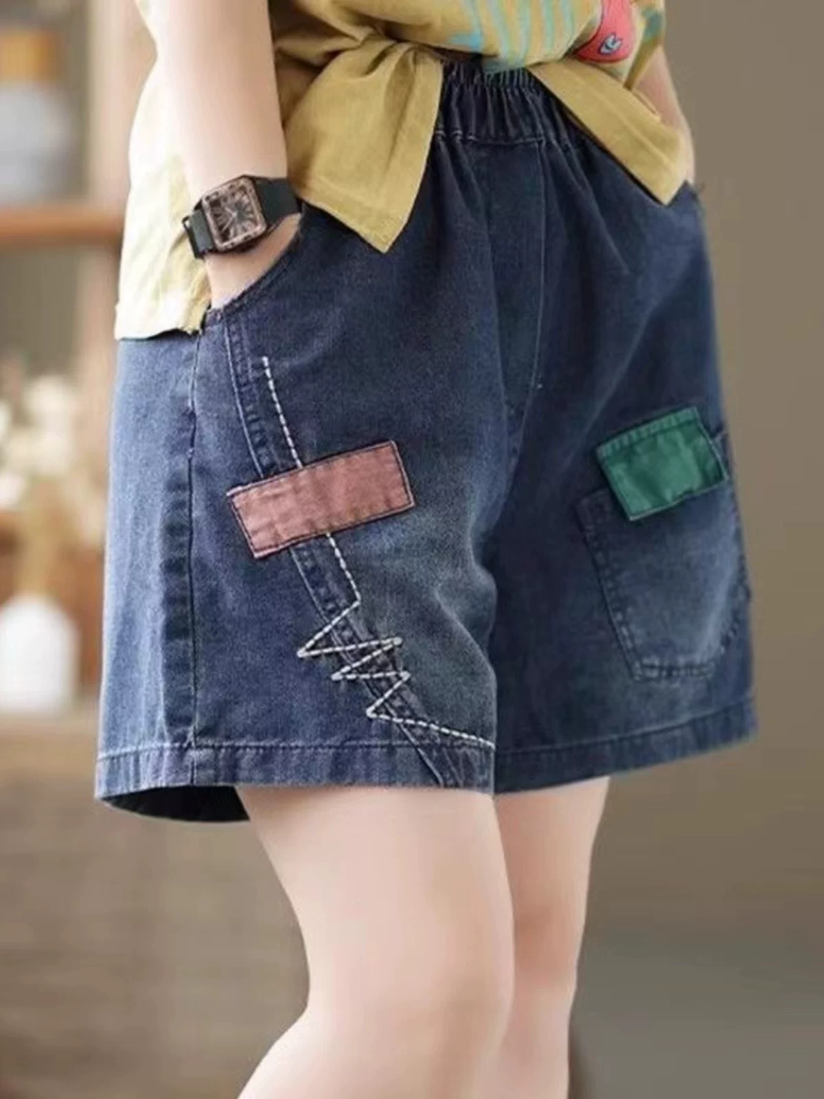 Quần short denim nữ hè 2026 kiểu Hàn Quốc mới, phong cách casual, cạp cao, phối vải, lưng thun, dáng rộng, ống rộng