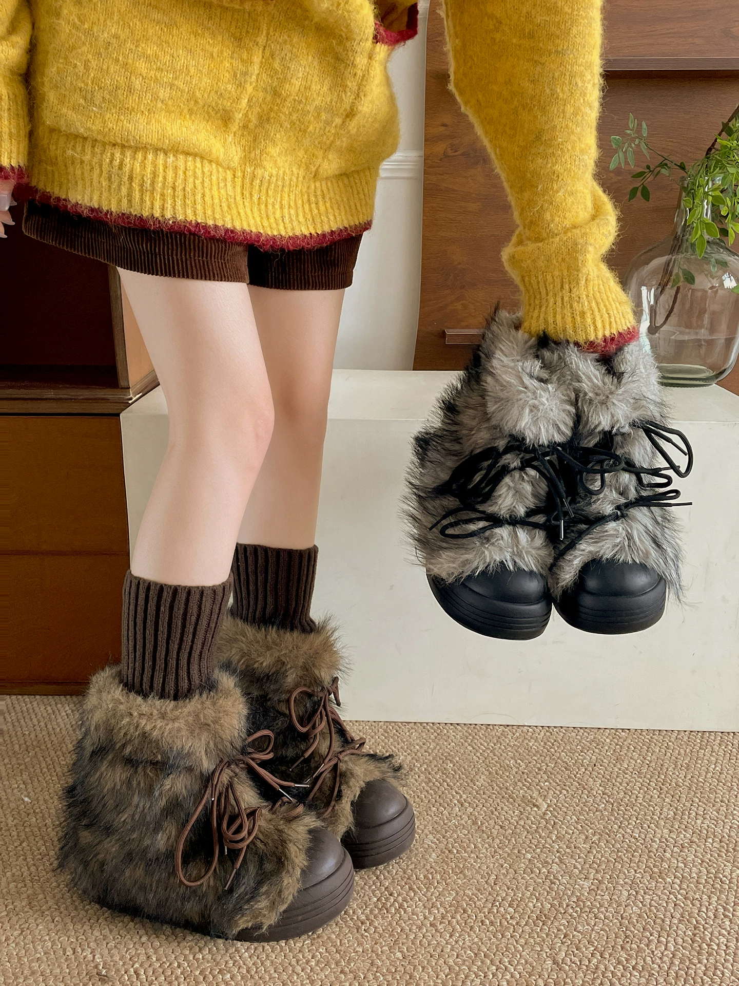 Giày bốt tuyết đế dày lót lông cừu đen dành cho nữ, mẫu mới mùa đông 2025, giữ ấm, chống trơn trượt, lót bông mềm mại.