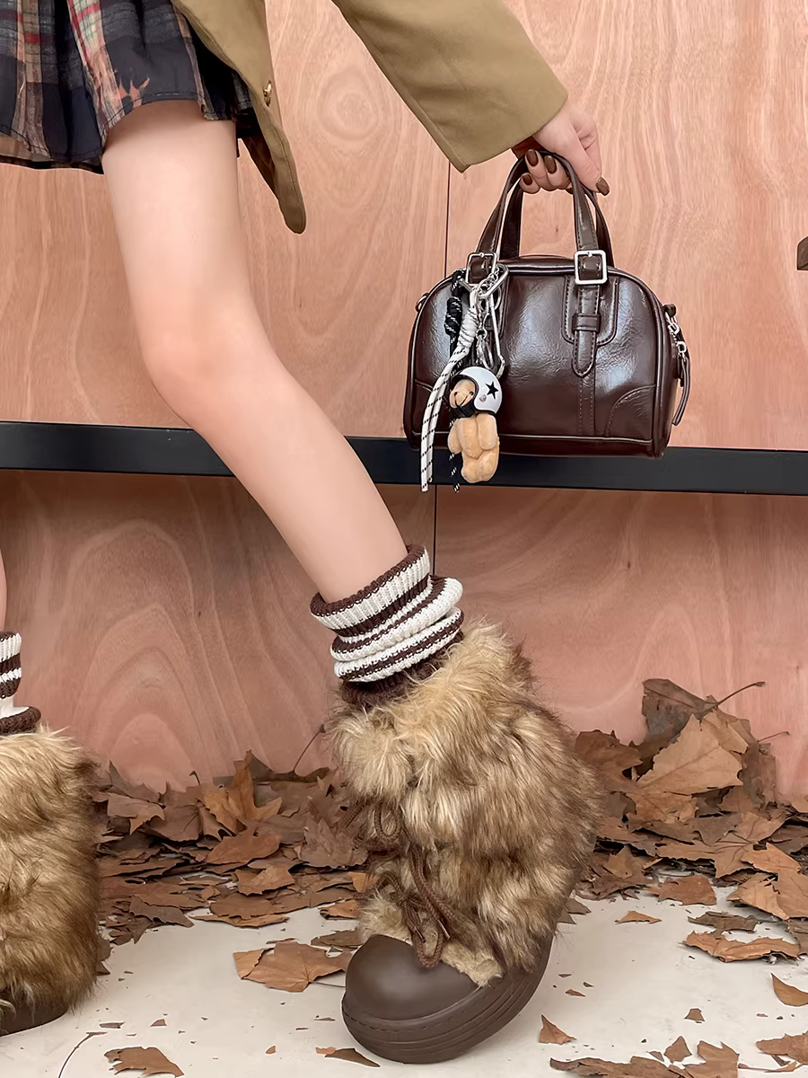 Giày bốt nữ đế dày lót lông cừu tăng chiều cao, mẫu mới mùa đông 2025 giữ ấm chống trơn trượt.