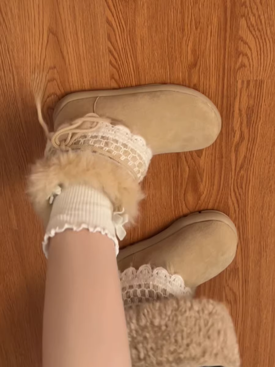 Giày bốt nữ đế dày lót lông cừu giữ ấm, giày mùa đông 2025 mới chống trơn trượt, lót bông dày dặn.