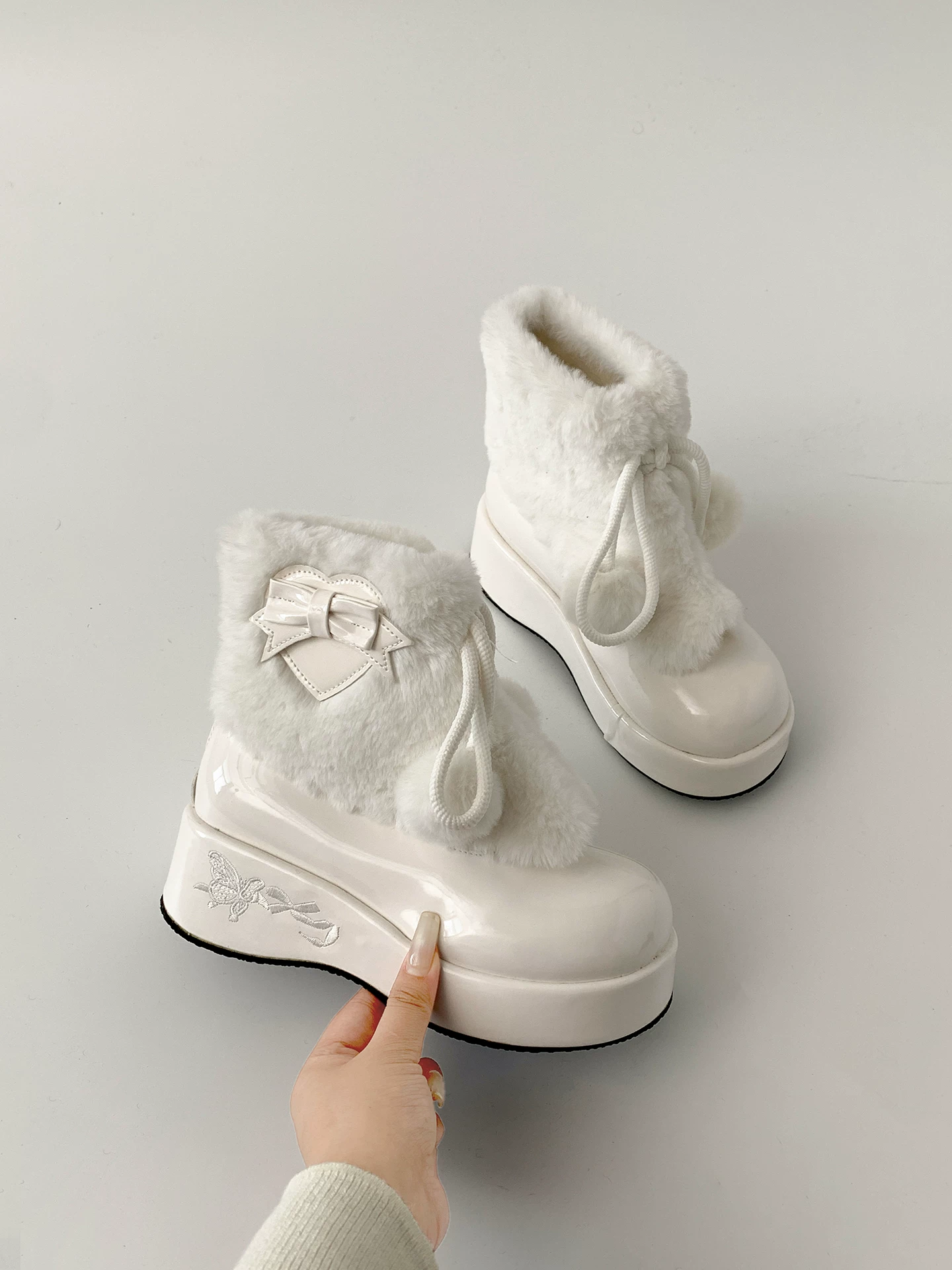 Giày bốt đi tuyết đế dày cổ điển màu trắng Nanzai dành cho nữ, trang phục ngoài trời ấm áp mùa đông mới năm 2025, giày cotton Đông Bắc.