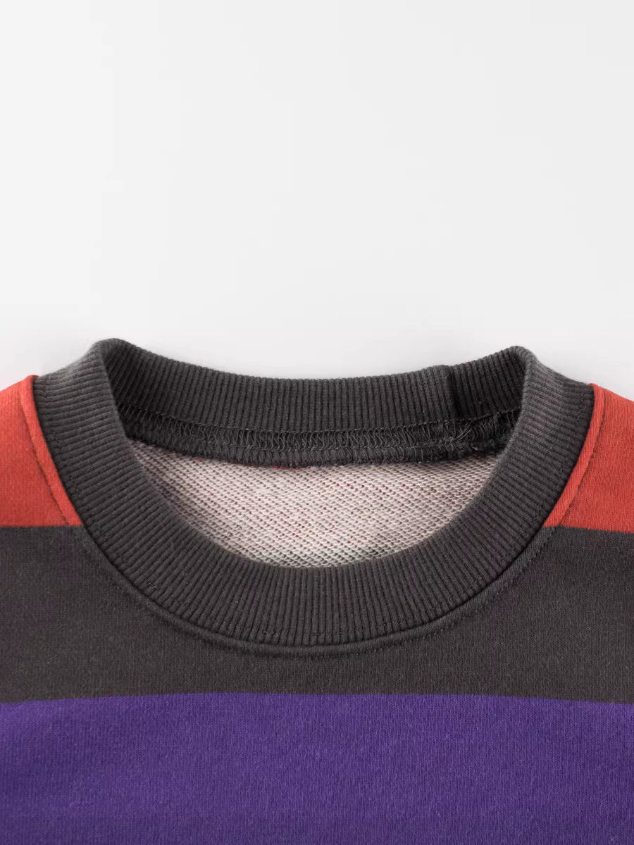 Áo thun trẻ em xuân đông 2025 kiểu mới cổ tròn sọc kẻ bé trai bé gái phong cách Hàn Quốc áo trơn thời trang