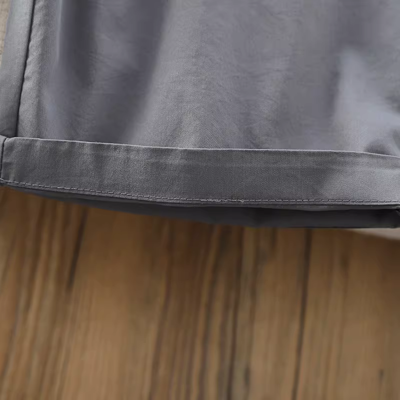 Quần trẻ em trơn màu hè 2025 kiểu mới quần lửng bé trai nhanh khô mỏng quần bảy phần quần đùi trẻ em thời trang