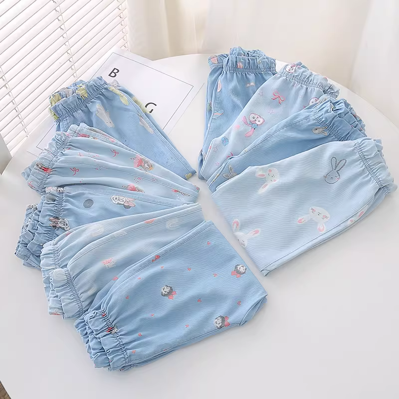 Quần denim Tencel trẻ em, quần chống muỗi chín phần, kiểu mới hè 2025, quần đèn lồng in họa tiết dày dặn cho bé gái
