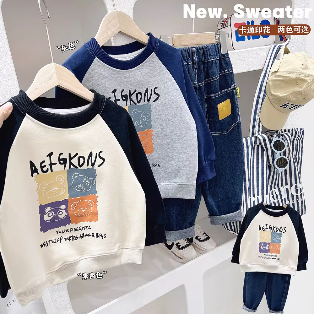 Áo thun bé trai tay raglan, trang phục thể thao mùa xuân thu, áo lót kiểu mới 2025, áo cổ tròn dài tay mỏng thời trang trẻ em.