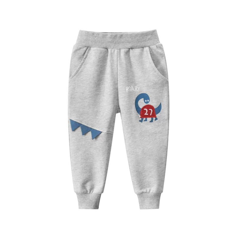 Quần dài bé trai, cotton nguyên chất, quần áo trẻ em phong cách Hàn Quốc, hàng mới xuân thu 2025, quần trẻ em cỡ nhỏ và vừa, quần thể thao hình khủng long, kiểu dáng mỏng, hợp thời trang.