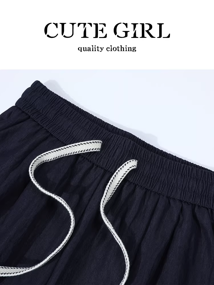 Bộ đồ thu sớm độc đáo và siêu thời trang dành cho nữ, gồm áo sơ mi xanh kèm khăn choàng và quần ống rộng, bộ hai mảnh.