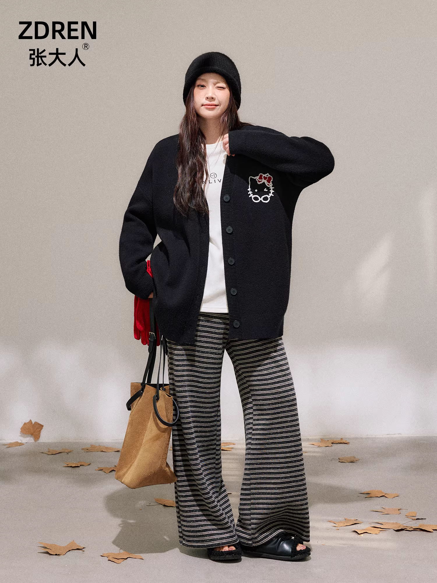 Quần áo nữ cỡ lớn dành cho người lớn, phụ nữ hơi mũm mĩm, giảm béo mùa đông, phong cách lười biếng, áo len đen, bộ quần sọc thường ngày.