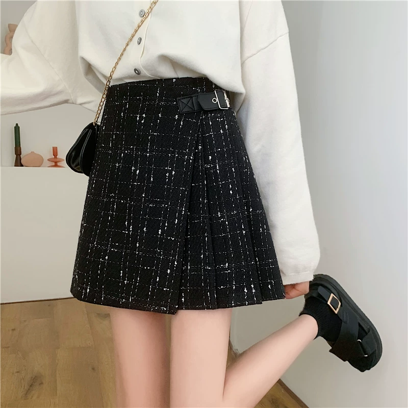 Quần váy xếp ly không đều màu đen bằng len cỡ lớn dành cho nữ, váy chữ A ôm hông lưng cao, váy ngắn mùa thu đông.