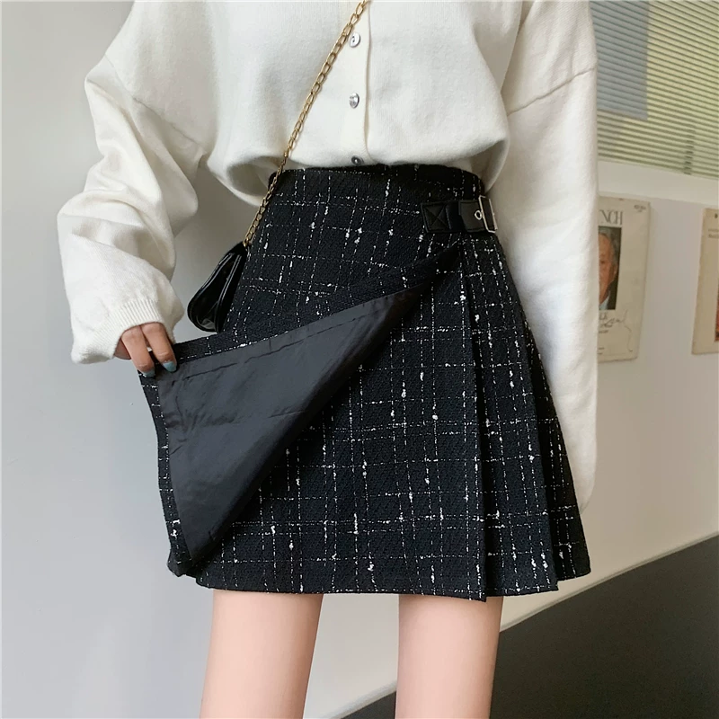 Quần váy xếp ly không đều màu đen bằng len cỡ lớn dành cho nữ, váy chữ A ôm hông lưng cao, váy ngắn mùa thu đông.