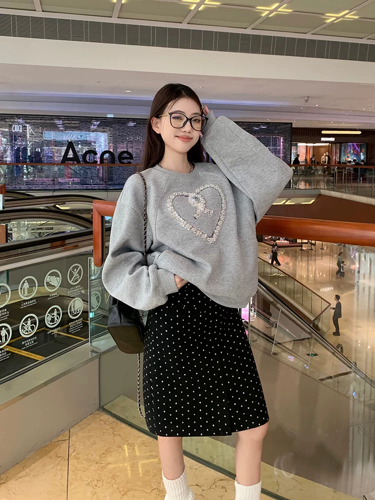 Váy chấm bi đen cổ điển dành cho nữ mùa thu đông, cạp cao, dáng nhỏ nhắn, thiết kế xẻ tà, váy chữ A, váy len dài trung bình