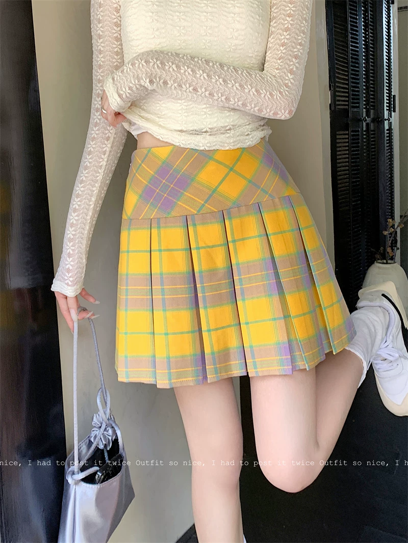 Váy xếp ly kẻ sọc vàng cổ điển kiểu Mỹ mùa hè cỡ lớn eo cao váy ngắn giảm béo váy kẻ sọc chữ A ôm hông dành cho nữ