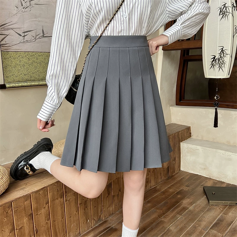 Váy xếp ly màu xám cực dài dành cho phụ nữ cao, váy ngắn phồng eo cao kiểu chữ A, váy chống lộ dành cho học sinh.