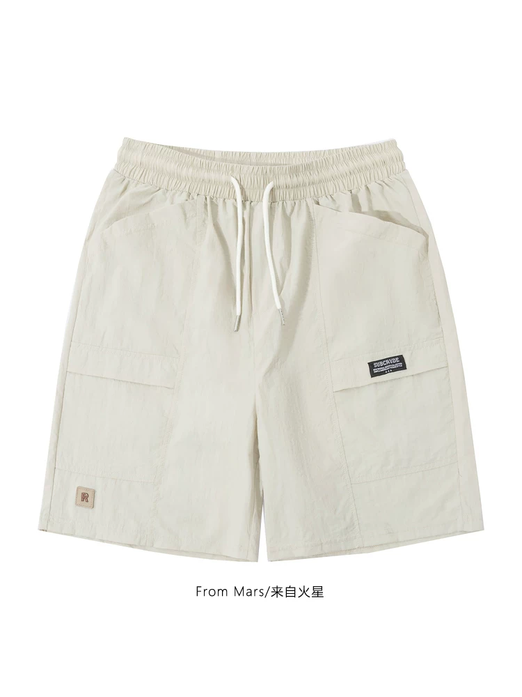 Từ sao Hỏa Mùa hè mát mẻ Phong cách Nhật Bản Thời trang màu trơn Thiết kế túi lớn Quần short rộng rãi đa năng