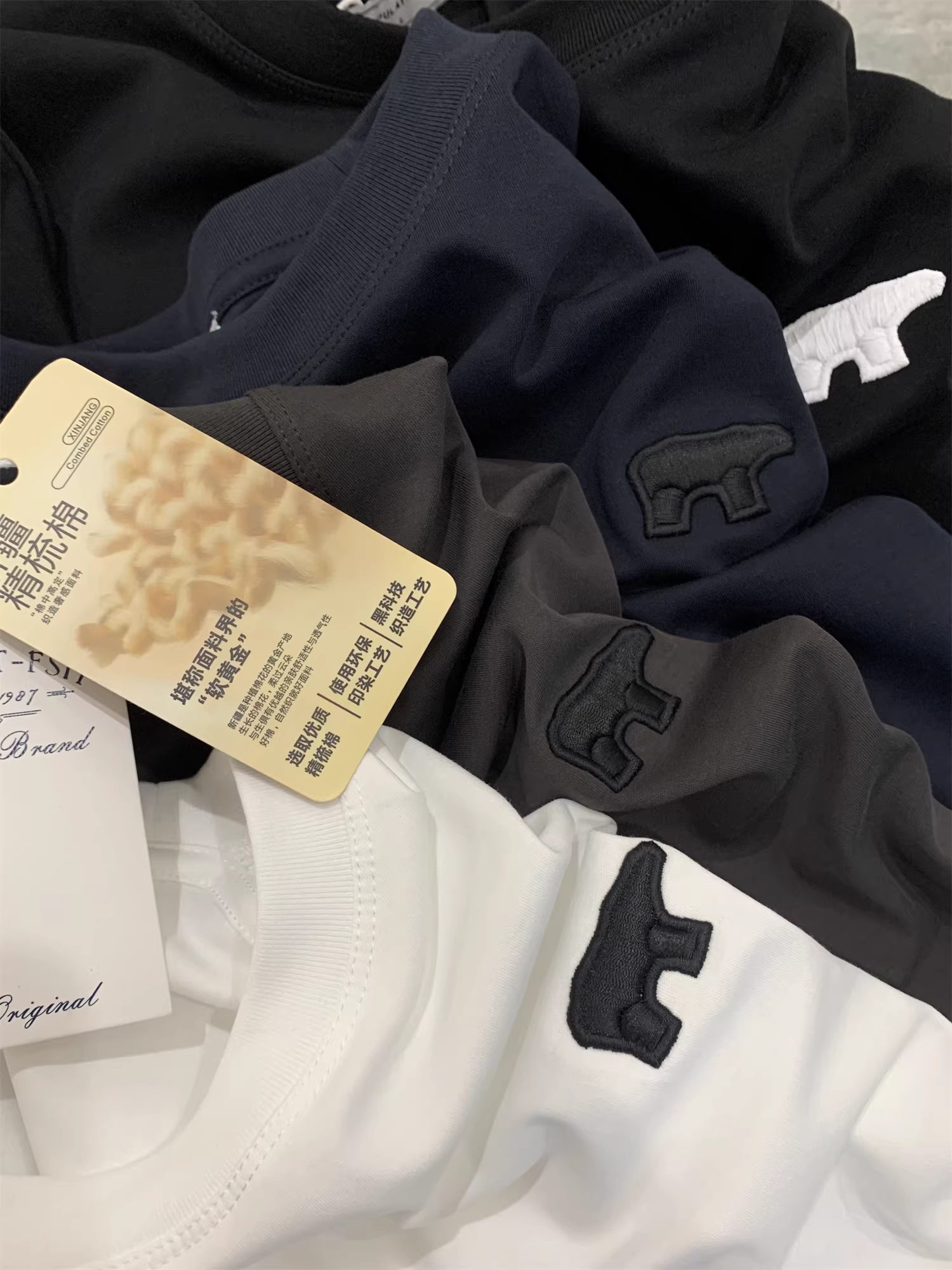 Đơn đặt hàng của công ty Don Quixote ODM! Áo thun nam tay ngắn cổ tròn thêu họa tiết màu trơn đa năng, thân thiện với da, hợp thời trang mùa xuân hè