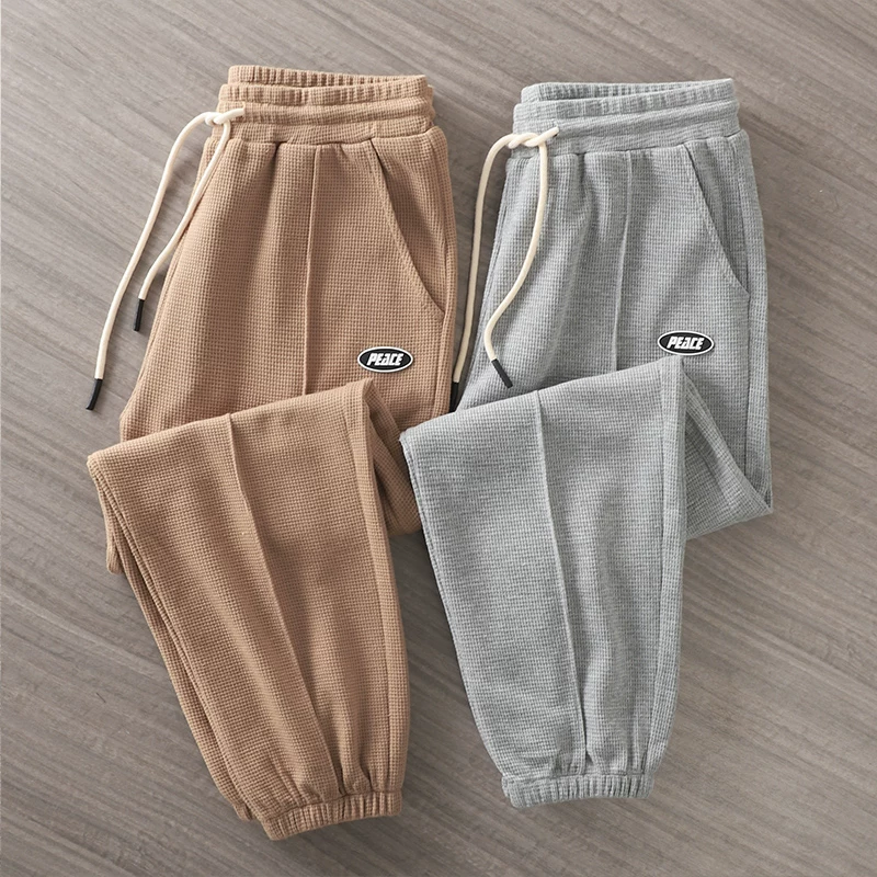 Quần thể thao kiểu waffle hạng nặng kiểu Mỹ dành cho nam, phong cách mùa thu, thời trang đường phố Trung Quốc, quần jogger rộng rãi, quần thể thao màu xám