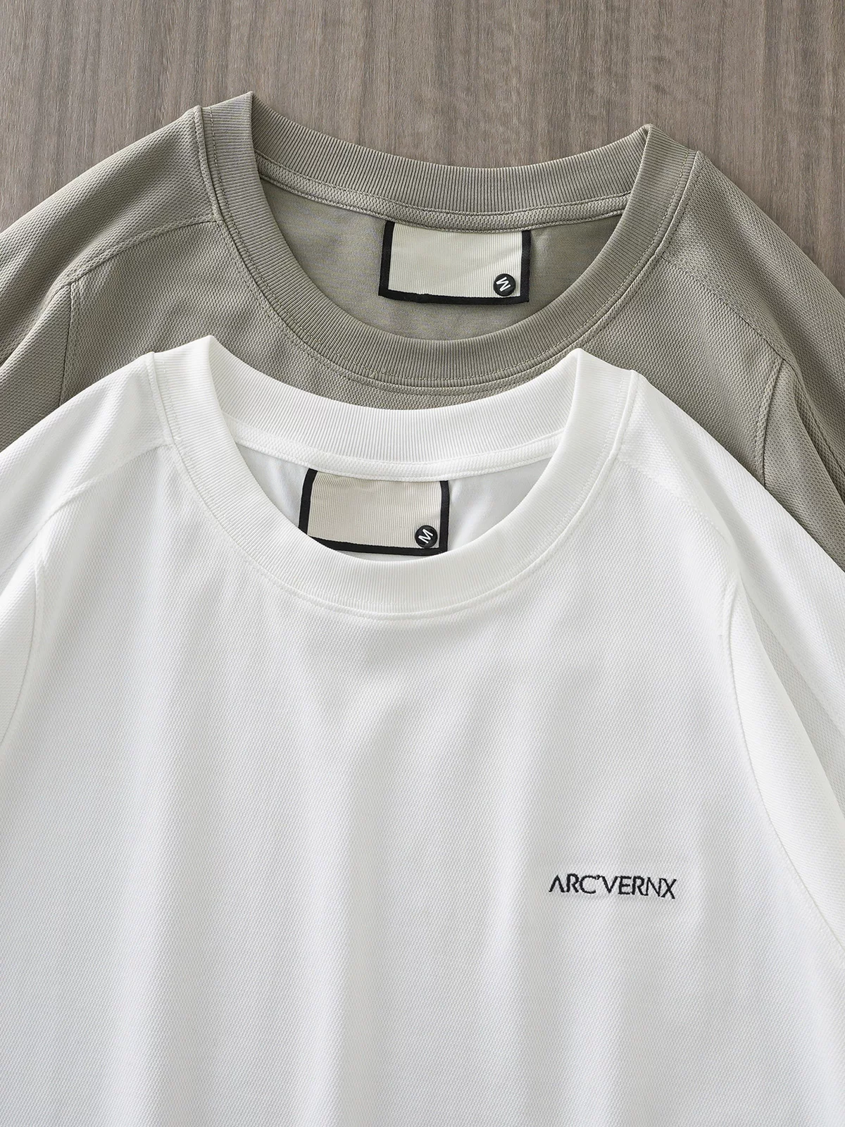 Áo thun ngắn tay cotton khô nhanh kiểu Mỹ OMZM dành cho nam giới trong mùa hè, áo thun lưới mỏng thoáng khí có thêu chữ, cổ tròn nửa tay